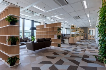 View of the reception desk and lobby area at Sev.en Energy.