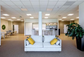 Grey sofa in the lounge area for NESS employees