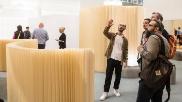 Guided tour of the exhibition stand with commentary