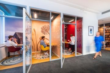 Colourful phone booths for quiet calls