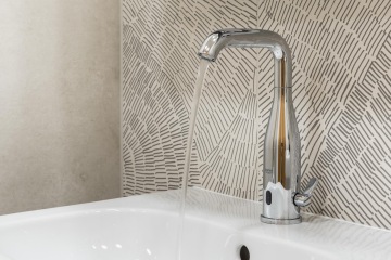 Sensor-responsive faucets