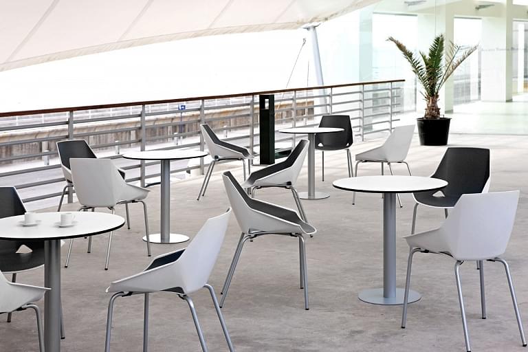 Modern outdoor terrace design with seats and rain awning